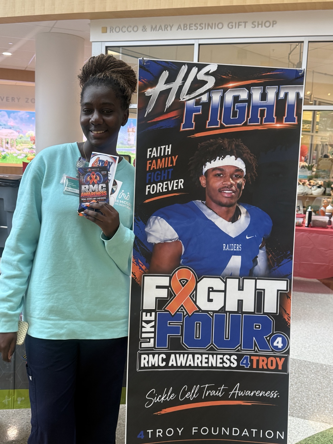 Supporter with the Fight Like 4 awareness banner