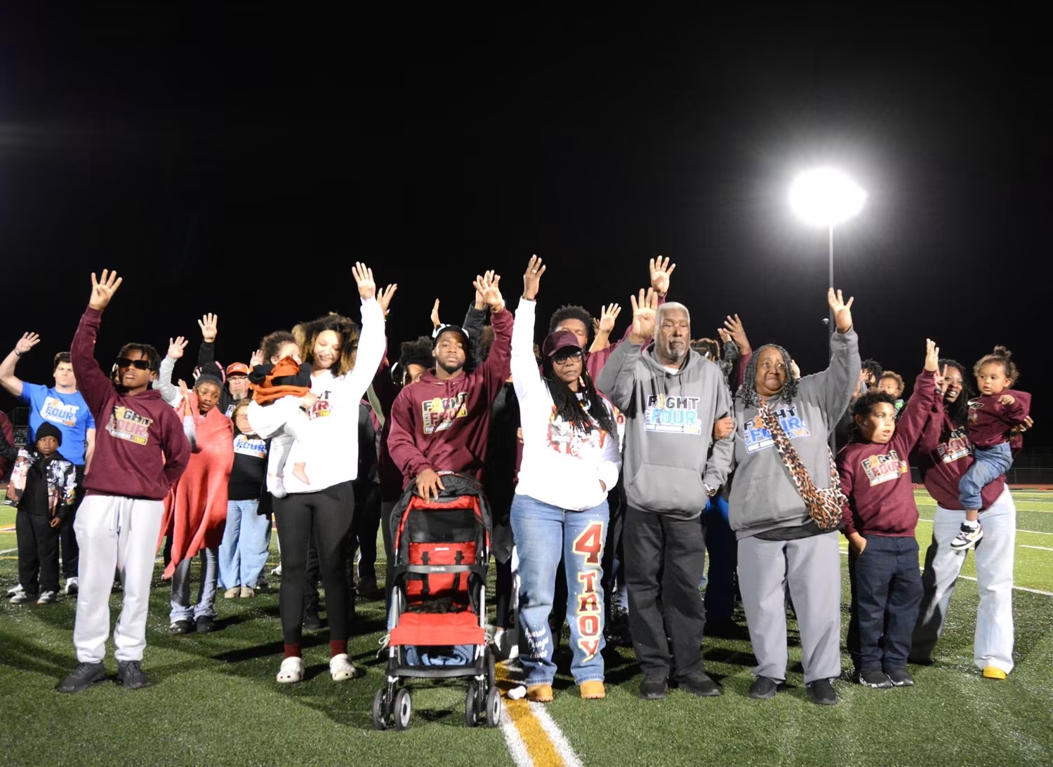 Family, friends, former coaches, and teammates gathered on the field at Milford High School for the 4Troy Remembrance and RMC Awareness Game