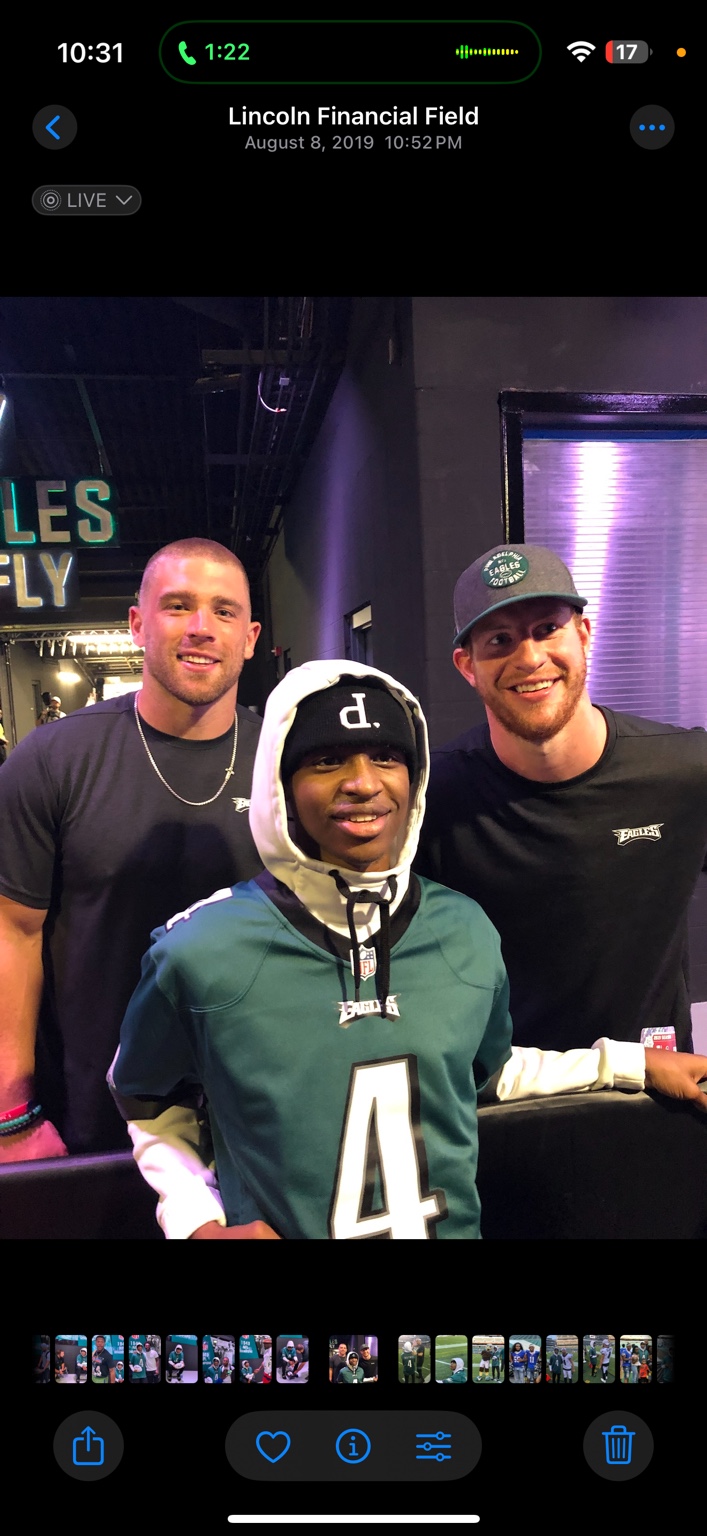 Troy with two Eagles players
